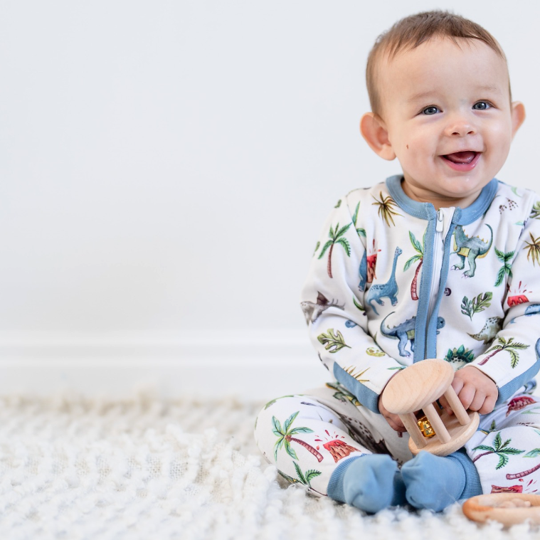 Baby wearing a soft bamboo sleepsuit from GrowGrows