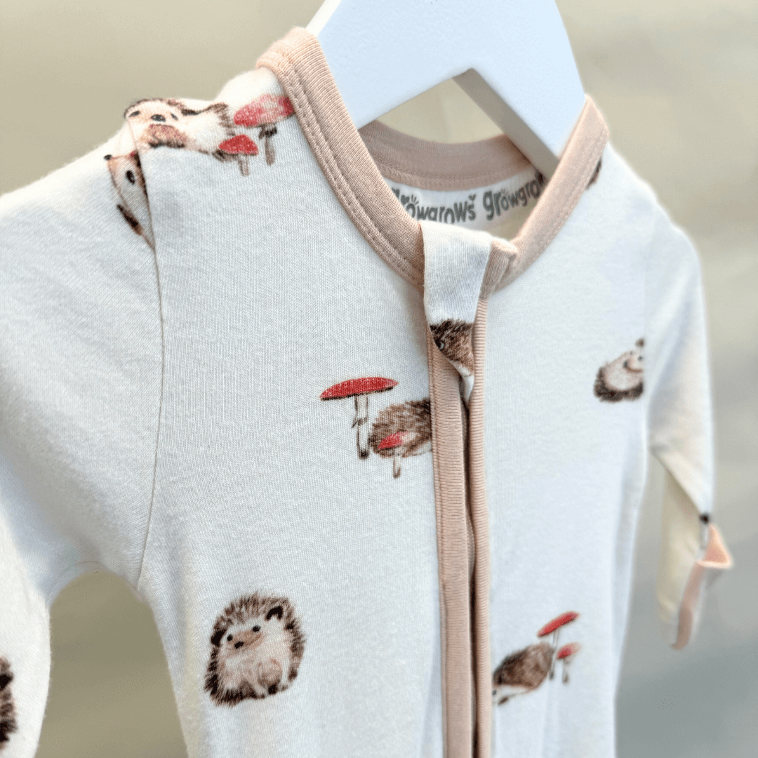Close up of the Happy Hedgehogs Sleepsuit with hedgehog print made from bamboo and organic cotton from GrowGrows