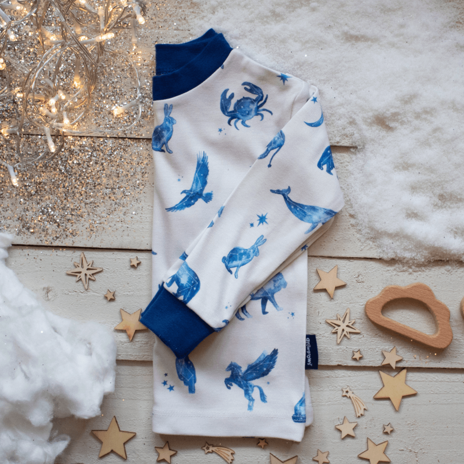Folded Cosmic Constellations Pyjamas with celestial star print made from bamboo and organic cotton from GrowGrows