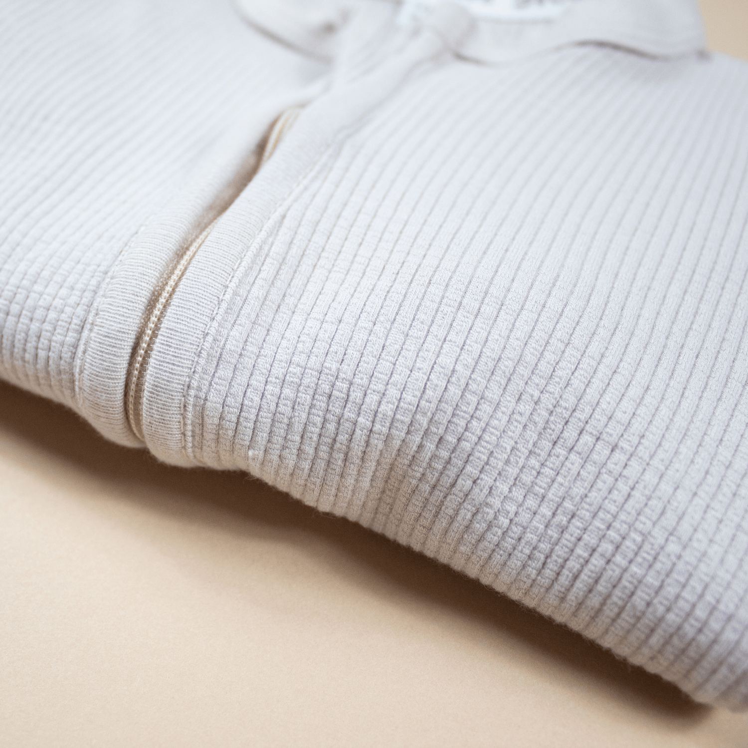 Close-up of the fabric on the Cashmere Ribbed Sleepsuit made from bamboo and organic cotton from GrowGrows