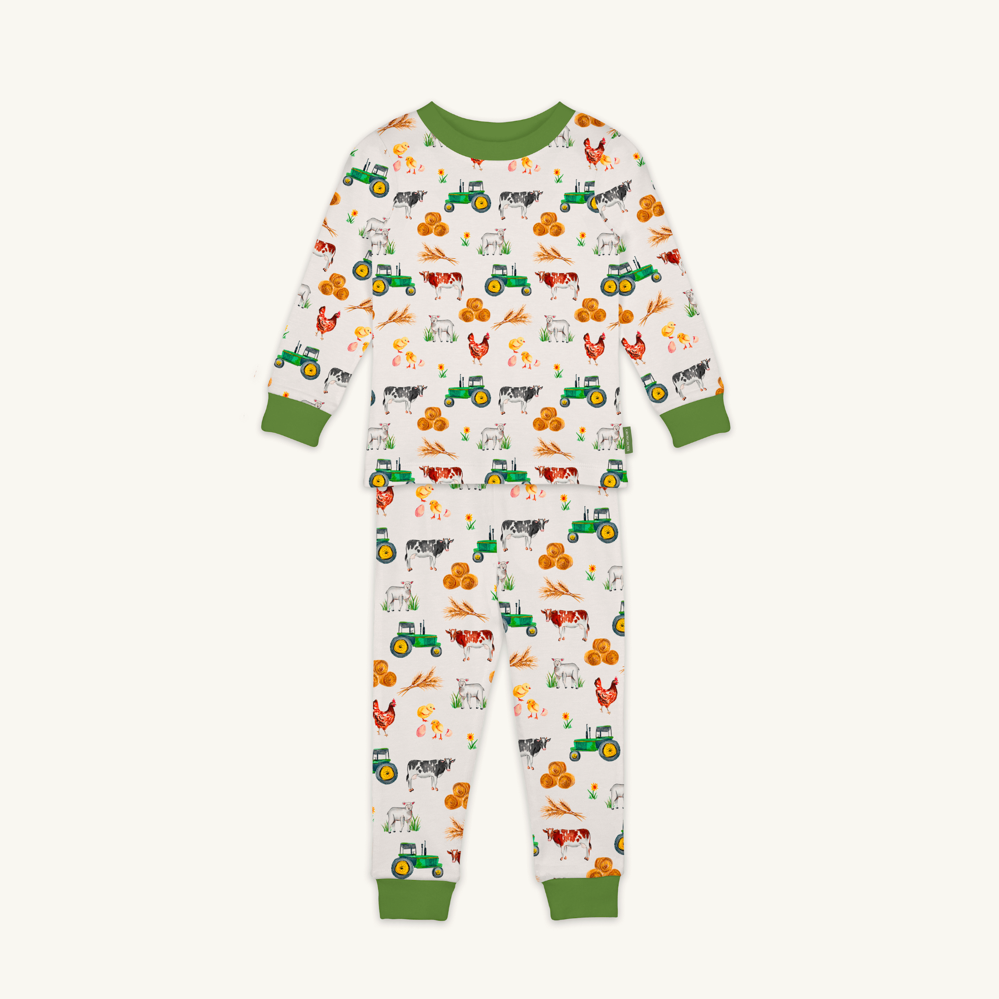 Family Farm Pyjamas with farmyard animal and tractor print made from bamboo and organic cotton from GrowGrows on white background