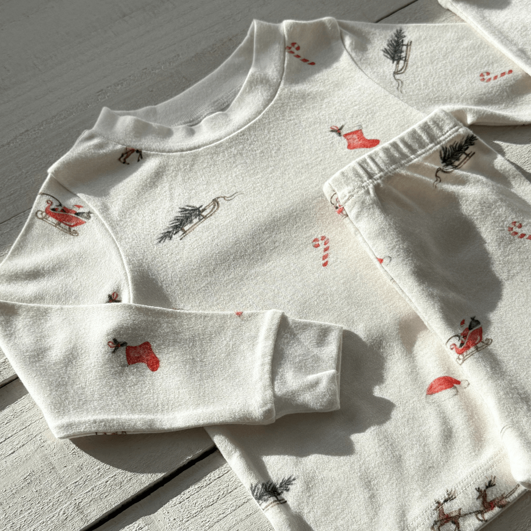 Christmas Eve Pyjamas with Santa and reindeer print made from bamboo and organic cotton from GrowGrows
