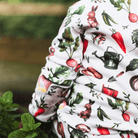 Close up of a the Allotment Adventure Pyjamas with vegetable allotment print made from bamboo and organic cotton from GrowGrows