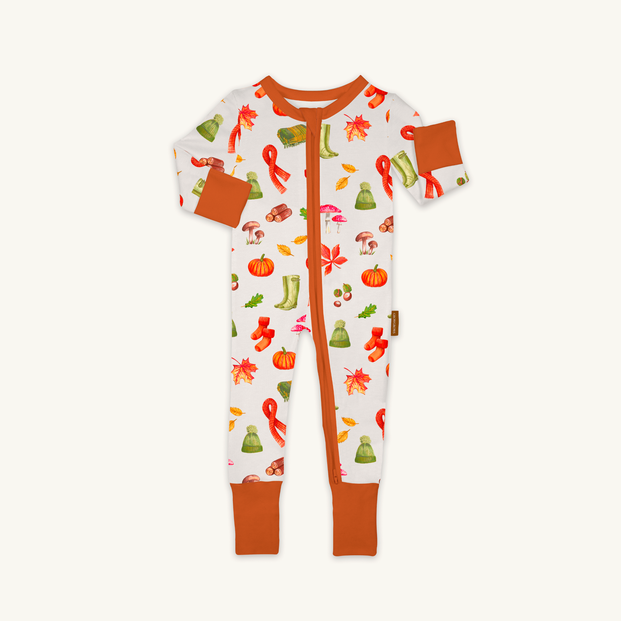 Autumnal Amazes Sleepsuit with pumpkin and autumn print made from bamboo and organic cotton from GrowGrows on white background