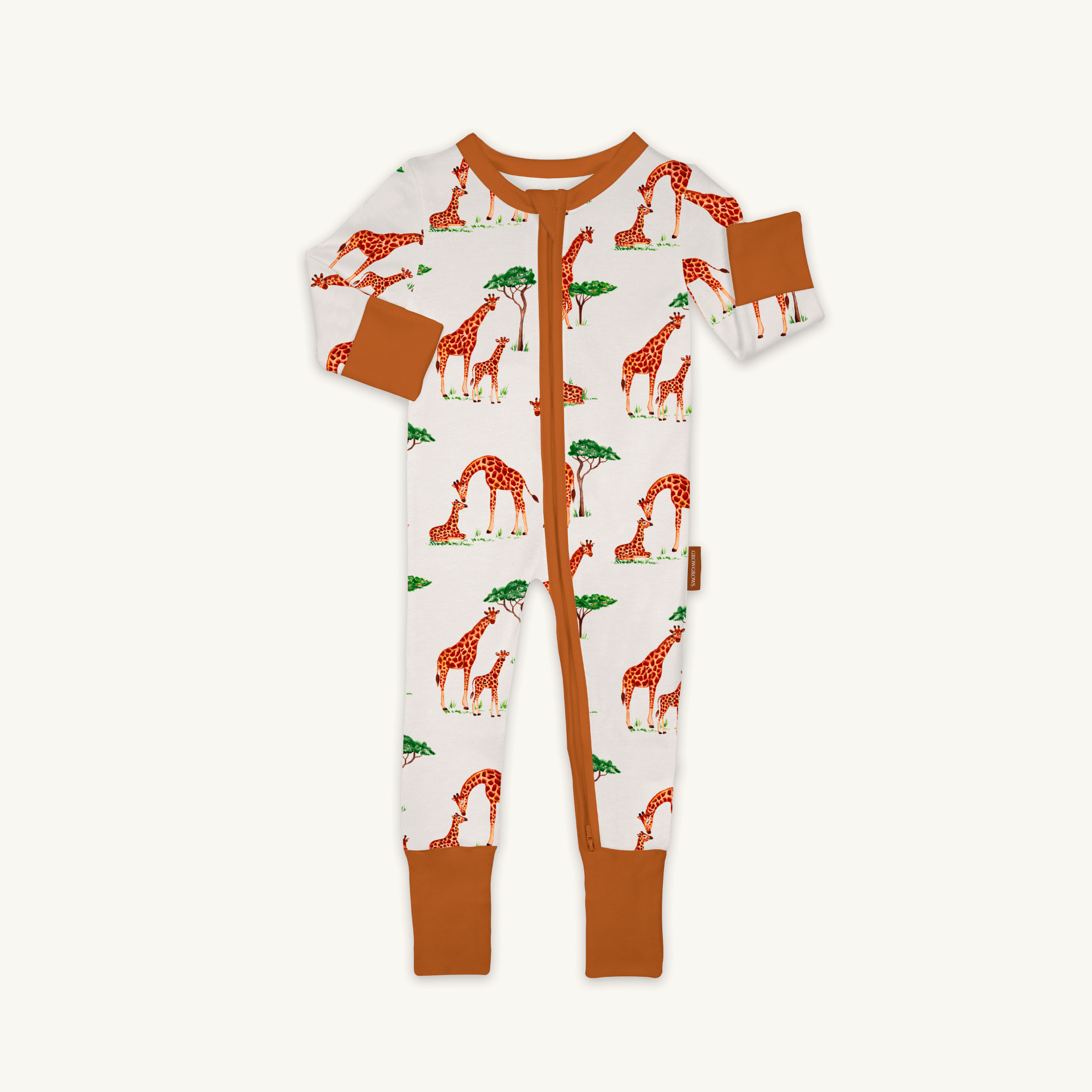 Gentle Giraffes Sleepsuit with mum and baby giraffe savannah print and desert orange trim made from bamboo and organic cotton from GrowGrows
