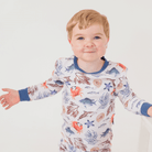 Child wearing Sea Life Pyjamas with ocean-inspired sea creature print made from bamboo and organic cotton from GrowGrows
