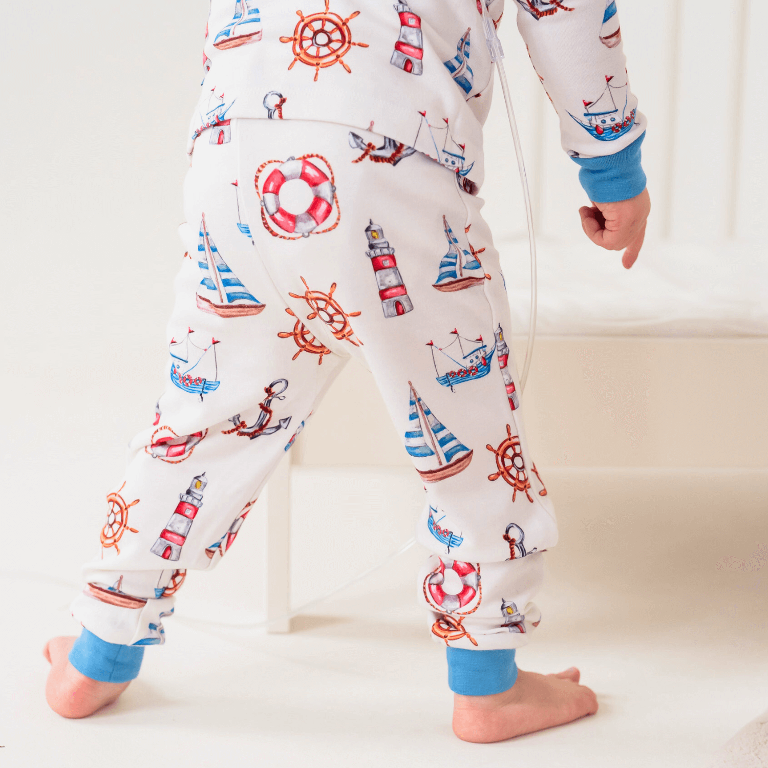 Close up on the trousers of the Seaside Sailor Pyjamas with nautical sailing print made from bamboo and organic cotton from GrowGrows