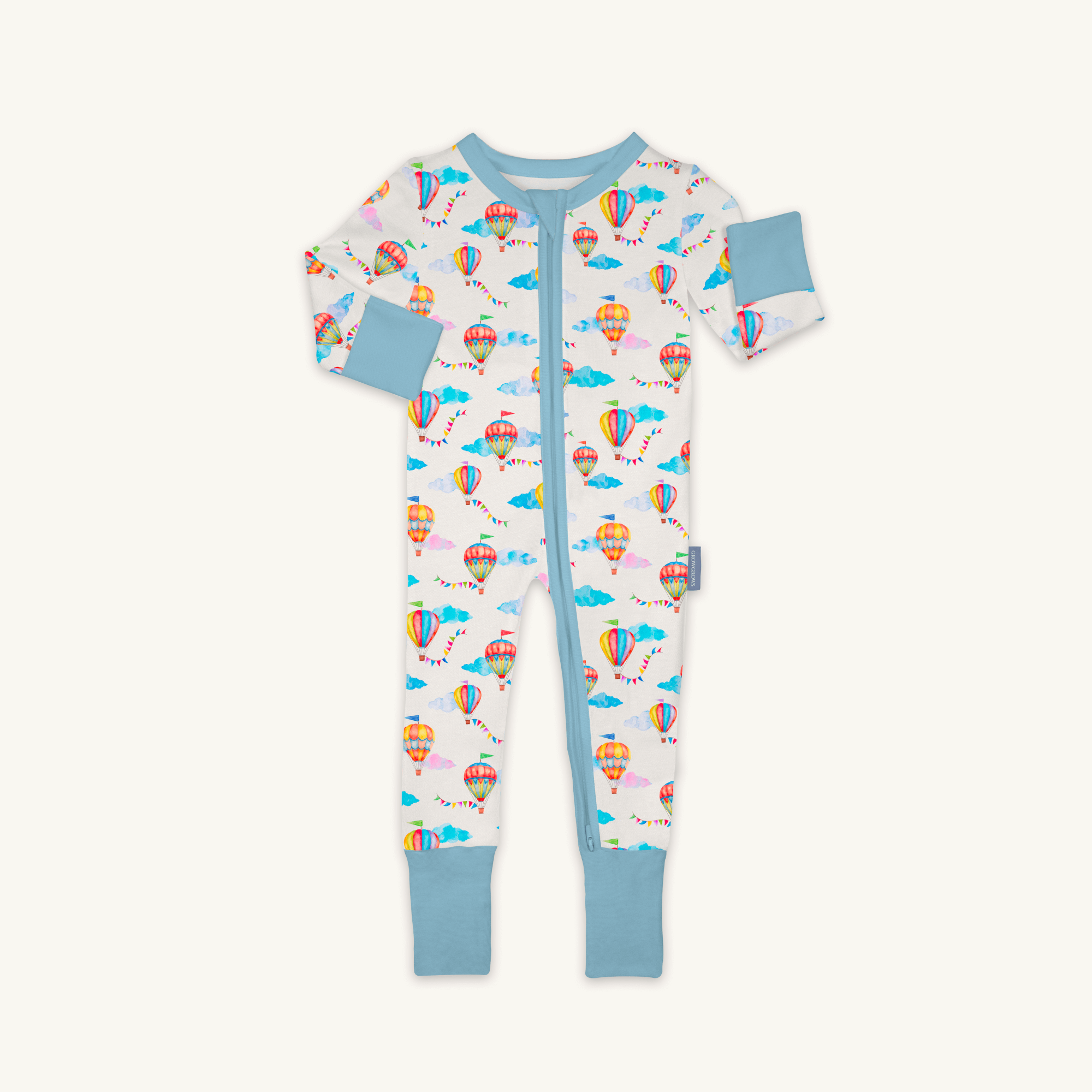Up, Up & Away Sleepsuit with hot air balloon and cloud print made from bamboo and organic cotton from GrowGrows on white background